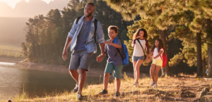 Locum tenens doctor outside with family