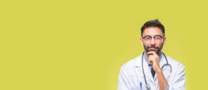 Locum tenens physician with hand on chin