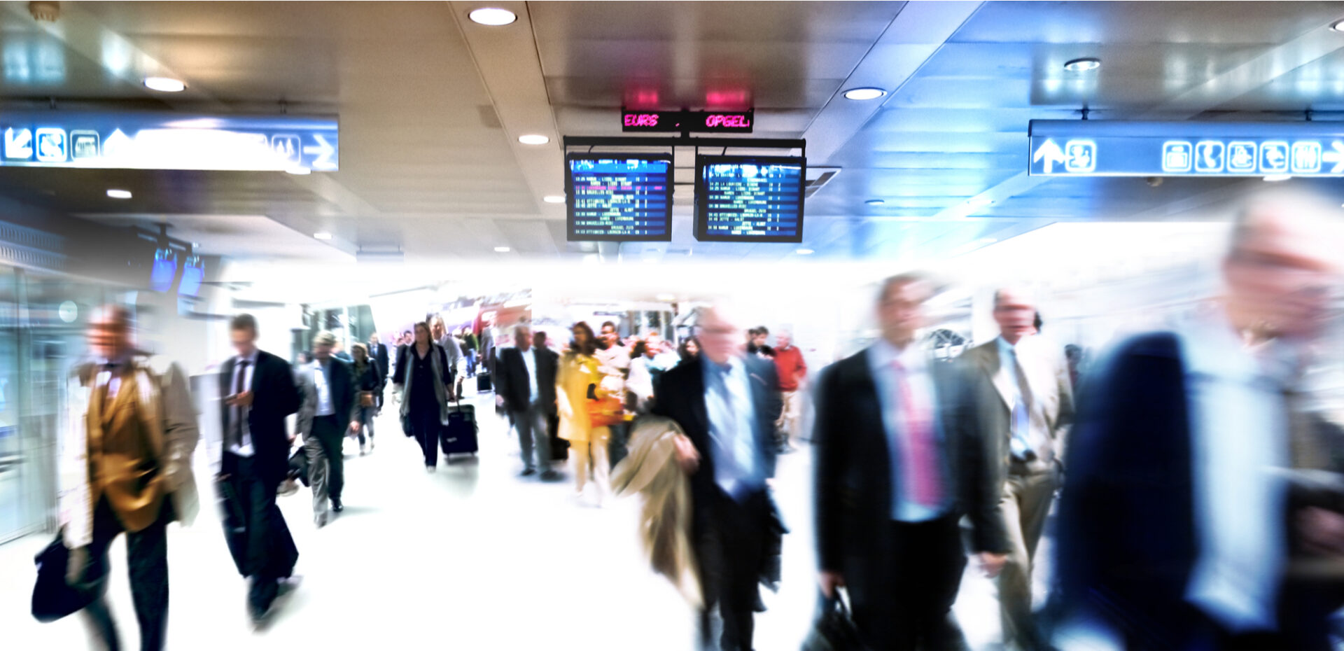 Group of people in airport terminal
