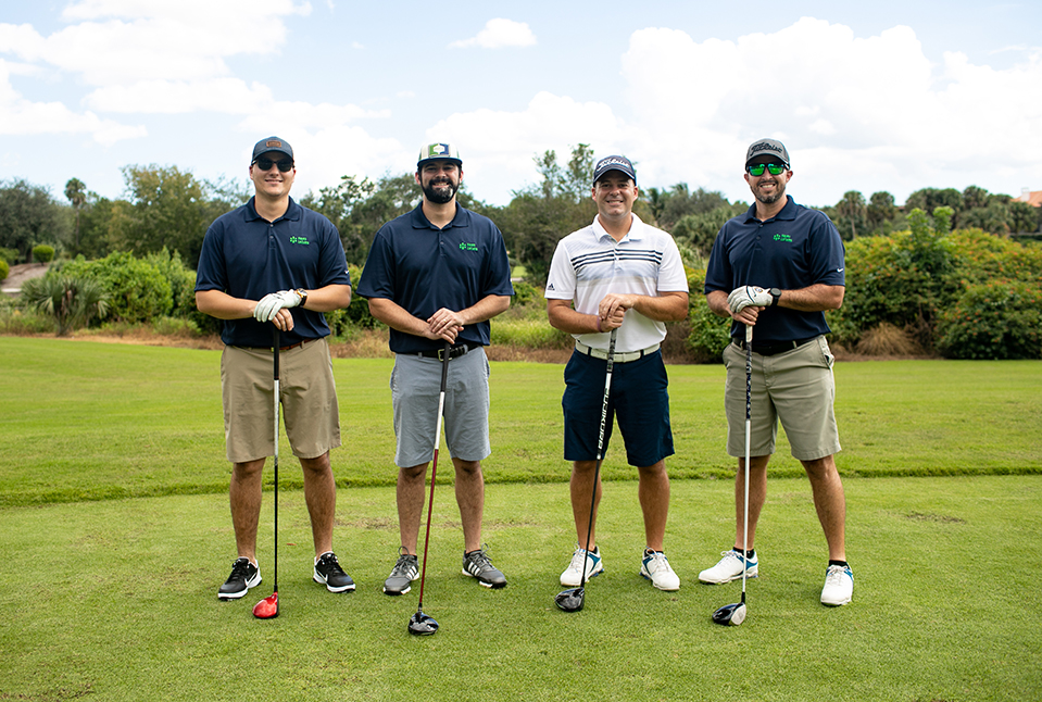 Hayes Locums employees on golf course at 4KIDS tournament
